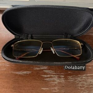 Dolabany Lilian m brown half rim eyeglasses. 54-17-140. Bronze metallic w/case